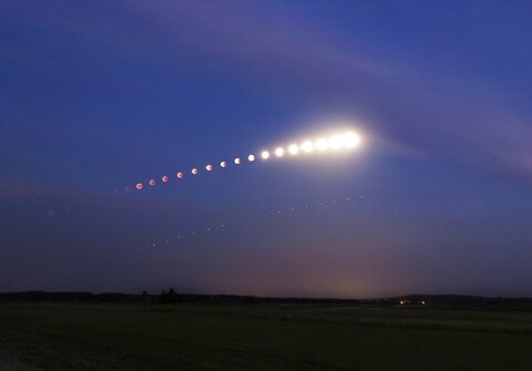 Germany, composite sequence of total lunar eclipse with Mars stock photo