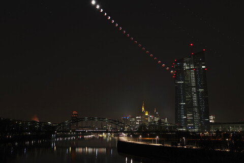 Germany, Frankfurt on Main, composite sequence of total lunar with European Central Bank stock photo