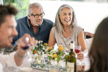 Happy family having meal together - PESF01288