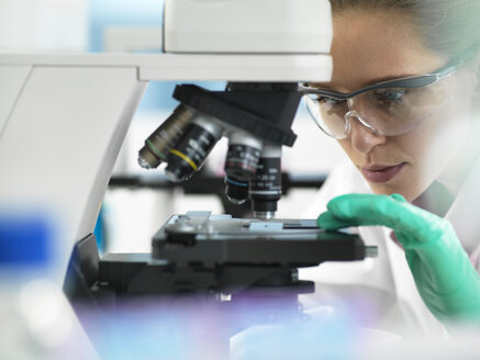 Health Screening, Scientist holding a tube containing a blood sample ready for analysis in the laboratory - ABRF00322