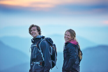 Hikers on misty day, Manigod, Rhone-Alpes, France - CUF48871