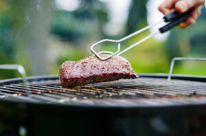 Grilling lamb fillet on charcoal grill - PPXF00150