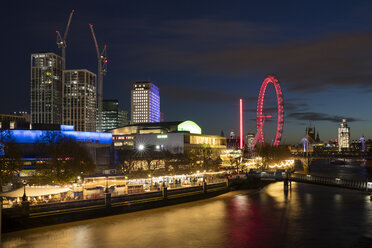 United Kingdom, England, London, Queen Elizabeth Hall, Royal Festival Hall and London Eye at River Thames at night - WIF03807