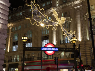 United Kingdom, England, London, Piccadilly Circus, Underground, Bus, Christmas illumination at night - WIF03808