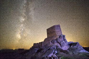 Spain, Guadalajara, Castle of Zafra at night, starry sky - DSGF01847