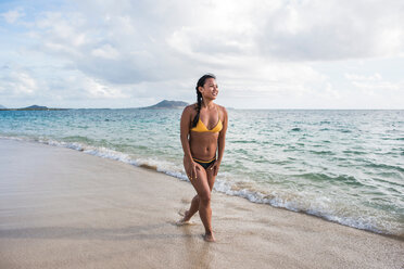 Woman in bikini, Lanikai Beach, Oahu, Hawaii - ISF20694