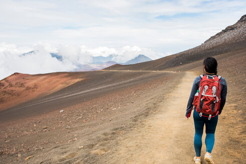 Hiker on hiking trail, Haleakala National Park, Maui, Hawaii - ISF20773