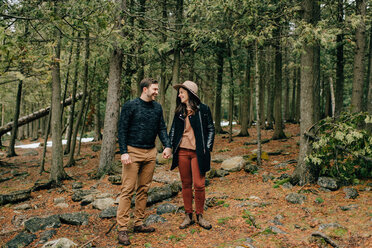 Couple hiking in forest, Tobermory, Canada - ISF20933