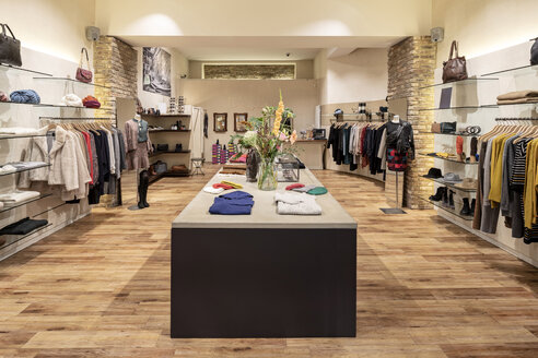 Interior of a modern concept store, displaying fashion - PESF01498