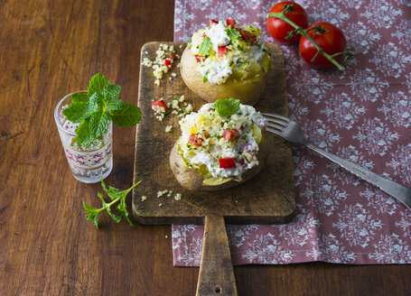 Baked patatoes with curd, couscous, tomato and mint - PPXF00185