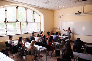 Female teacher asking questions to students in language school - MASF11268