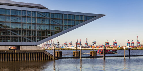 Germany, Hamburg, Altona, View of harbour, cranes and ships - WDF05123