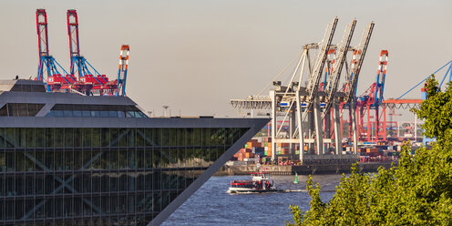 Germany, Hamburg, Altona, View of harbour, cranes and ships - WDF05124