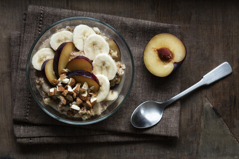 Cereals with banana and plum stock photo