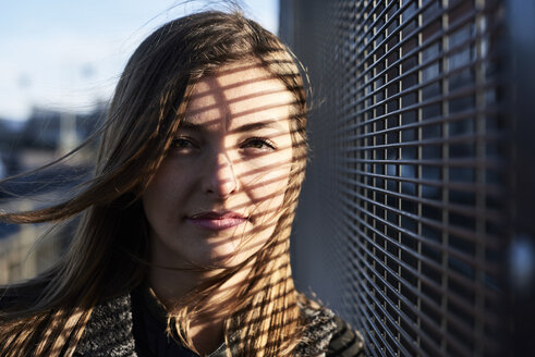 Portrait of young woman with shades on her face - IGGF00805