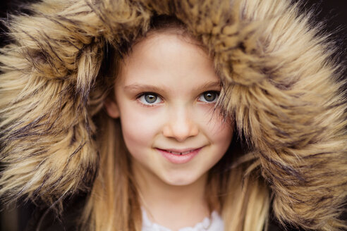 Portrait of smiling girl with plush hood - NMS00292