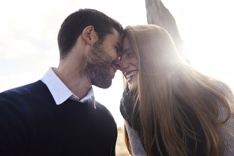 Happy affectionate couple outdoors stock photo