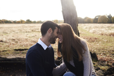 Happy affectionate couple in a park - IGGF00819