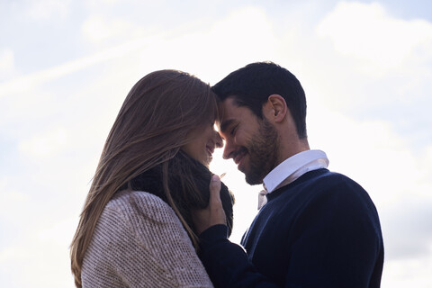 Happy affectionate couple outdoors stock photo