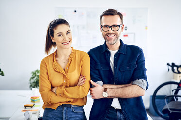 Portrait of smiling colleagues in office - BSZF01022