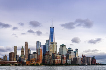 Modern buildings by Hudson River against sky during sunset - CAVF60963