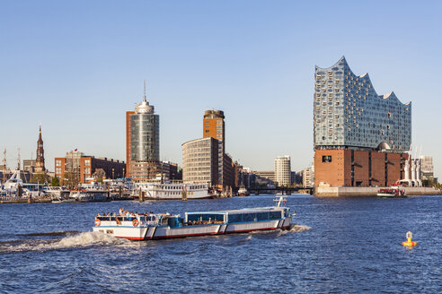 Germany, Hamburg, cityscape with Elbe Philharmonic Hall and tourboat on the Elbe - WDF05179