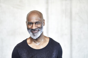 Portrait of sweating bald man with grey beard - FMKF05422