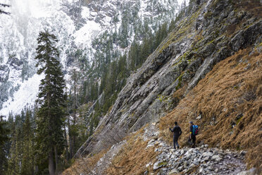 High angle view of hikers hiking on mountain during winter - CAVF61781