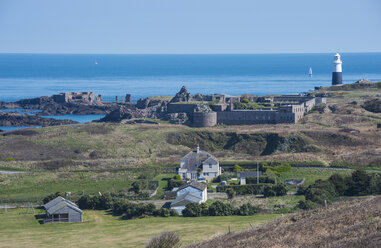 United Kingdom, Channel Islands, Alderney, Overlook over the east coast with lighthouse - RUNF01456