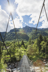Switzerland, Ticino, Verzasca Valley, swing bridge across Verzasca river - GWF05974