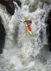 Man kayaking on waterfall on river - ALRF01431