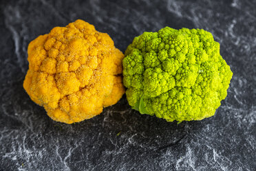 Yellow and bright green cauliflower on slate - SARF04142