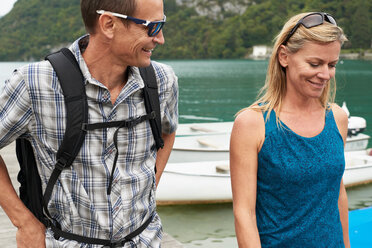 Mature couple strolling by Lake Annecy, Annecy, Rhone-Alpes, France - CUF49526