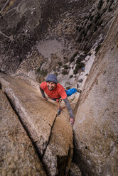 Climber trad climbing, Pine Creek, Bishop, California, USA - ISF21031