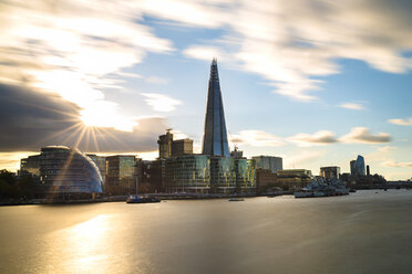 UK, London, River Thames, skyline with City Hall and The Shard at sunset - MKFF00440