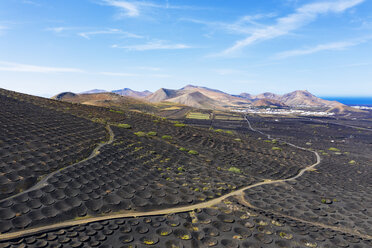 Spain, Canary Islands, Lanzarote, wine growing area La Geria villages Uga and Yaiza, Ajaches mountains, aerial view - SIEF08431