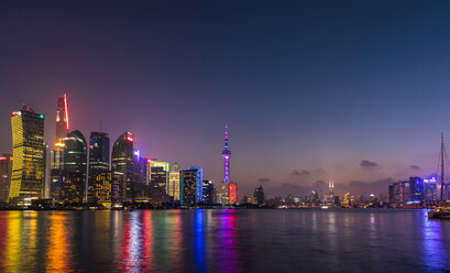 Pudong skyline and Huangpu river at night, Shanghai, China - CUF49822