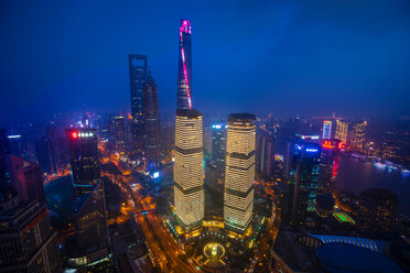 Pudong skyline with Shanghai Tower, Shanghai World Financial Centre and IFC at night, high angle view, Shanghai, China - CUF49830