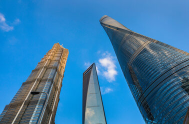 Jin Mao Tower, Shanghai Tower, Shanghai World Financial Centre against blue sky, low angle view, Shanghai, China - CUF49835