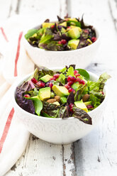 Detox salad bowl with avocado, pomegranate seeds, roasted soybeans, sunflower seeds and nuts - LVF07867