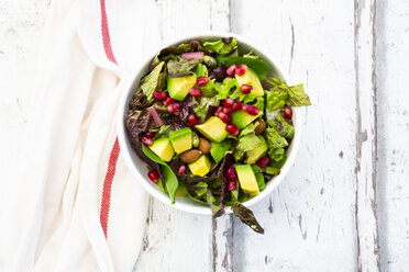 Detox salad bowl with avocado, pomegranate seeds, roasted soybeans, sunflower seeds and nuts - LVF07868