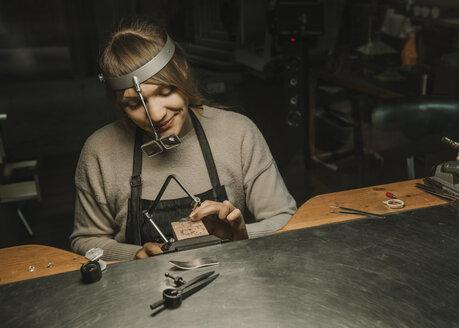 Artisan making jewellery in his workshop - AHSF00035