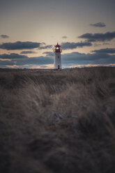 Germany, Sylt, Schleswig Holstein Wadden Sea National Park, dune landscape, Ellenbogen, lighthouse List Ost, evening light - ANHF00076