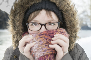 Portrait of woman with scarf in winter - MKFF00466