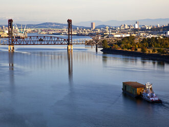 Tugboat Pushing Barge in River - MINF10898