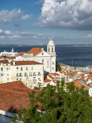 Portugal, Lisbon, Alfama, View from Miradouro de Santa Luzia over district with Sao Vicente de Fora Monastery, River Tagus - AMF06844