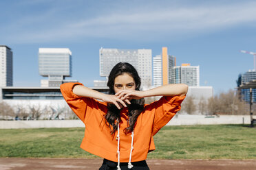 Young contemporary dancer wearing red hoodie shirt - JRFF02865