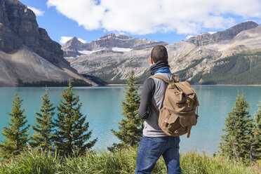 Canada, Jasper and Banff National Park, Icefields Parkway, man at lakeside - EPF00576