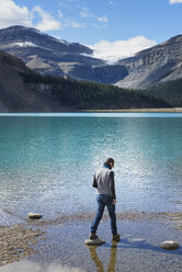 Canada, Jasper and Banff National Park, Icefields Parkway, man at lakeside - EPF00580