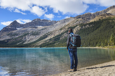 Canada, Jasper and Banff National Park, Icefields Parkway, man at lakeside - EPF00581